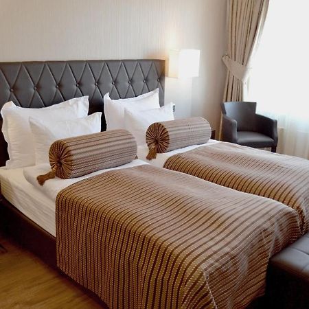 Hotel Vier Jahreszeiten Berlin City Pokoj fotografie