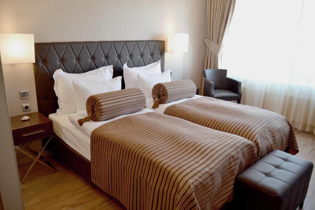 Hotel Vier Jahreszeiten Berlin City Pokoj fotografie